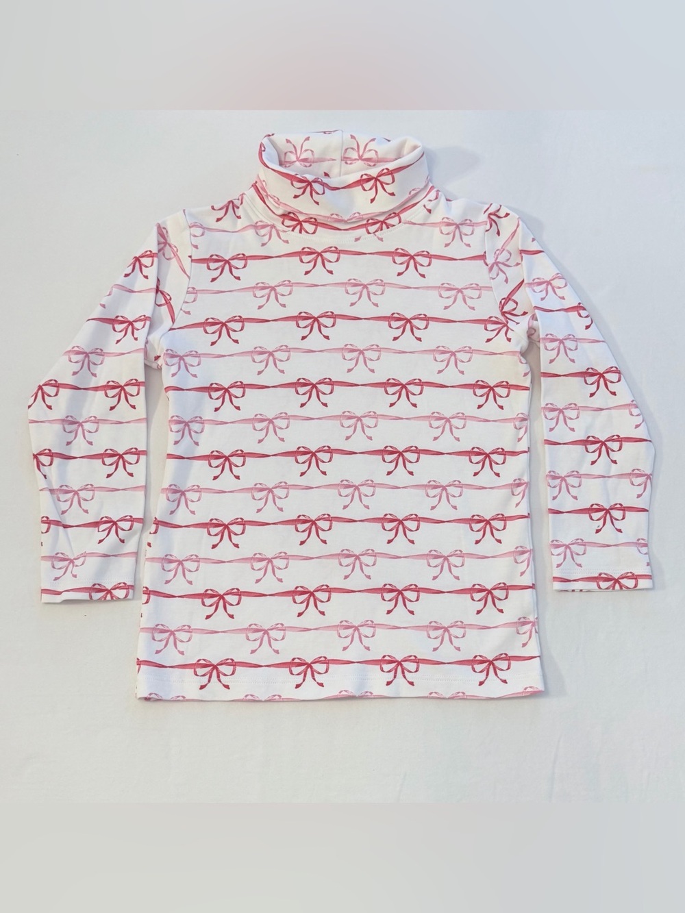 James & Lottie Girls' White Pima Cotton Turtleneck Top with Pink & Red Bows